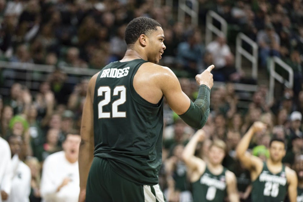 Freshman guard/forward Miles Bridges (22) motions to his teammates during the second half of men's basketball game against the University of Nebraska on Feb. 23, 2017 at Breslin Center. The Spartans defeated the Cornhuskers, 88-72.