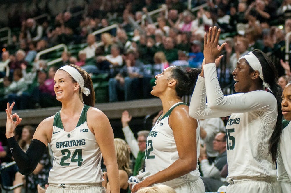 Spartans cheer on their teammates during the game against Nebraska on Feb. 14, 2017 at Breslin Center. The Spartans led 40-38 at halftime.