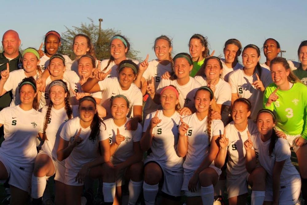 <p>The MSU women's club soccer team celebrates a national championship in Phoenix, Arizona. (Photo courtesy Dan Jury)</p>