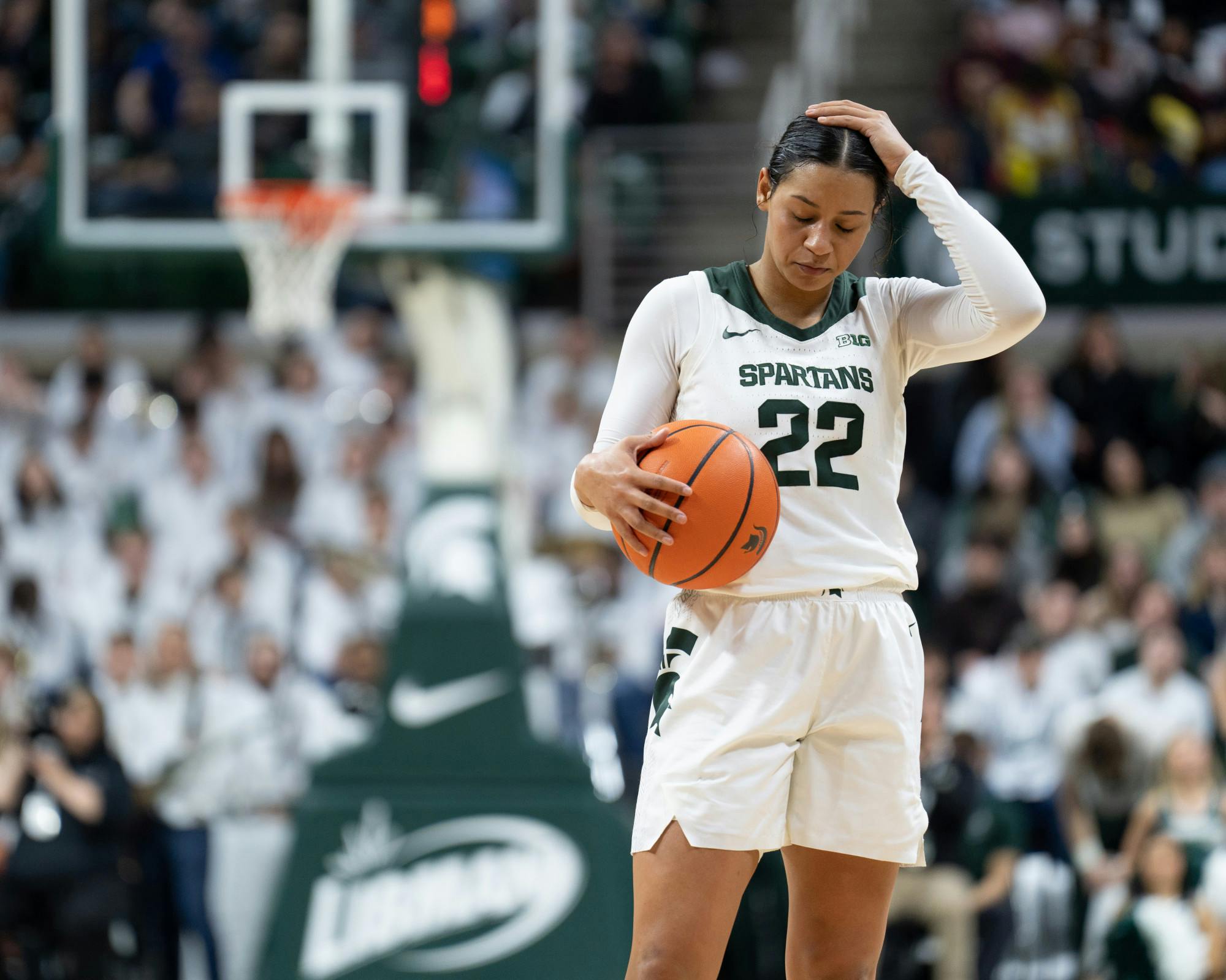 <p>Senior Guard Moira Joiner takes a breather before finishing out a gritty game against the University of Michigan at the Breslin Center on Sunday, Feb. 5, 2023. The Spartans lost 77-67 after leading the Wolverines for the entire first half.</p>
