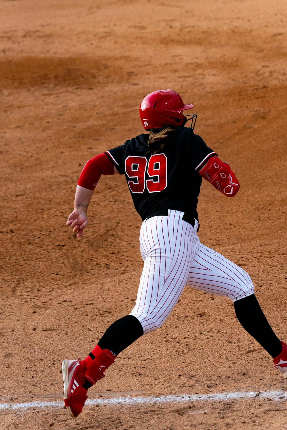 Nebraska Freshman Alexis Jensen rushing during the MSU V Nebraska Softball game at Secchia Stadium in East Lansing, on March 20 2026.