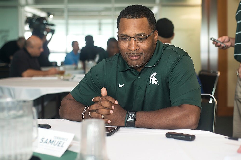 <p>Wide receivers coach Terrence Samuel talks to the media during Football Media Day at the Huntington Club of Spartan Stadium. Coming off of a 13-1 season and a Rose Bowl victory, the Spartans are due to kick off the season Aug. 29. Danyelle Morrow/The State News</p>