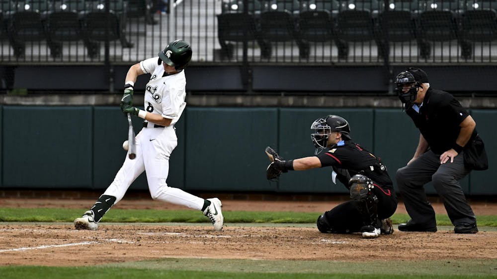 <p>MSU sophomore Isaac Sturgess swings at the ball at Jeff Ishbia Field at McLane Baseball Stadium in East Lansing, Mich., on Friday, April 24, 2026. </p>