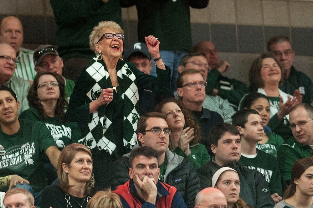 <p>Retired MSU teach education professor Janet Alleman dances during a dance cam as the crowd cheers her on Feb. 7, 2015, during the game against Illinois at Breslin Center. Erin Hampton/The State News</p>