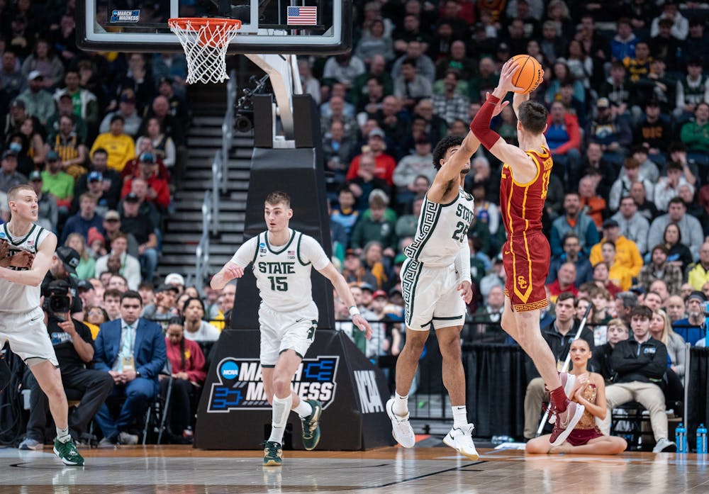 <p>Trojan guard Drew Peterson shoots at Nationwide Arena in Columbus, Ohio on March 17, 2023. The Spartans beat the Trojans, 72-62 in the first round of March Madness.</p>
