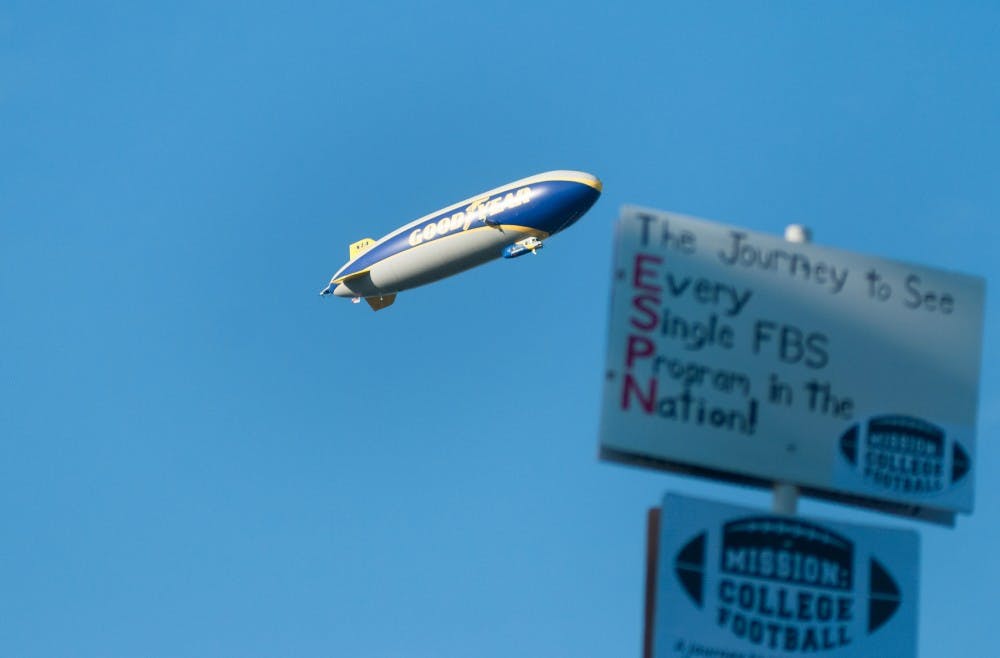<p>The Goodyear Blimp makes an appearance Sept. 12, 2015, at ESPN's College Gameday at Munn field. These blimps are used to capture aerial footage of sporting events. Jack Stephan/ The State News</p>
