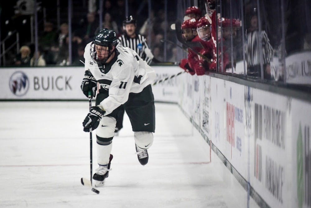 Freshman forward Tommy Apap (11) travels down the ice during the game against Wisconsin on Nov. 11, 2017 at Munn Ice Arena. The Spartans defeated the Badgers, 2-0. 