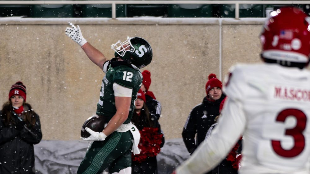 <p>MSU junior tight end Jack Velling (12) celebrates after scoring the Spartans' second touchdown against Rutgers at Spartan Stadium on Nov. 30, 2024.</p>