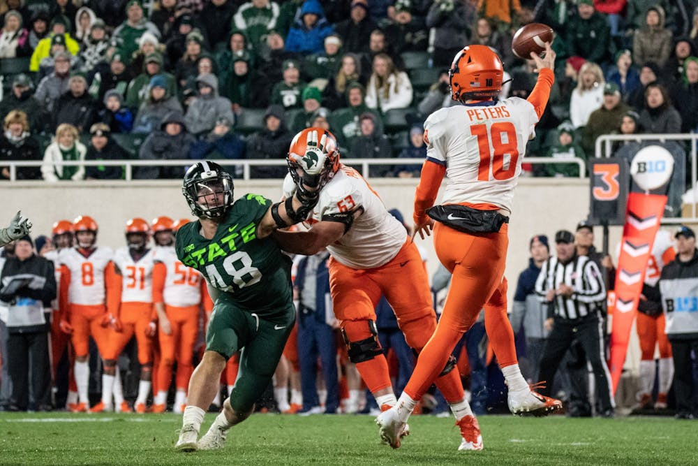 Redshirt senior Kenny Willekes (48) rushes the passer during the game against Illinois Nov. 9, 2019 at Spartan Stadium. The Spartans fell to the Fighting Illini, 37-34.