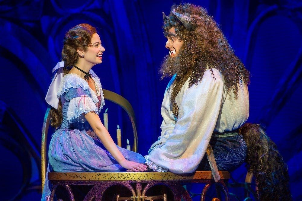 	<p>Hilary Maiberger and Darick Pead perform as Belle and the Beast in Disney&#8217;s Beauty and the Beast. Photo courtesy of Amy Boyle</p>