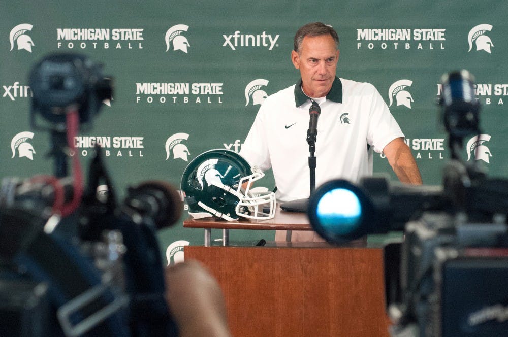 Head coach Mark Dantonio answers questions from the media on Monday, Aug. 6, 2012 at Spartan Stadium. Natalie Kolb/The State News