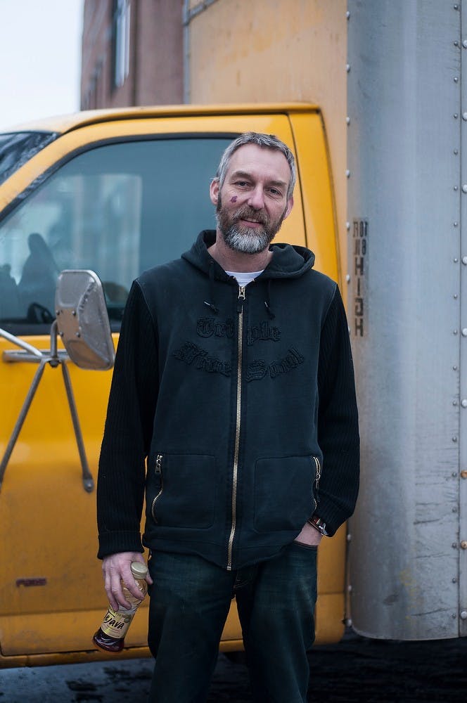 <p>Detroit resident Bart Dijkman poses for portrait Jan. 22, 2015, outside InFlight, 507 E. Grand River Ave. Allyson Telgenhof/The State News.</p>