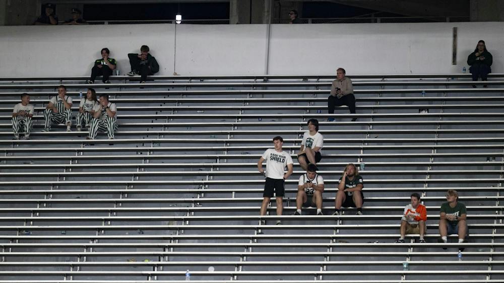 <p>Michigan State fans watch from a sparsely filled section during the third quarter of the Spartans’ game against Nebraska at Spartan Stadium in East Lansing, Mich., on Saturday, Sept. 26, 2026.</p>