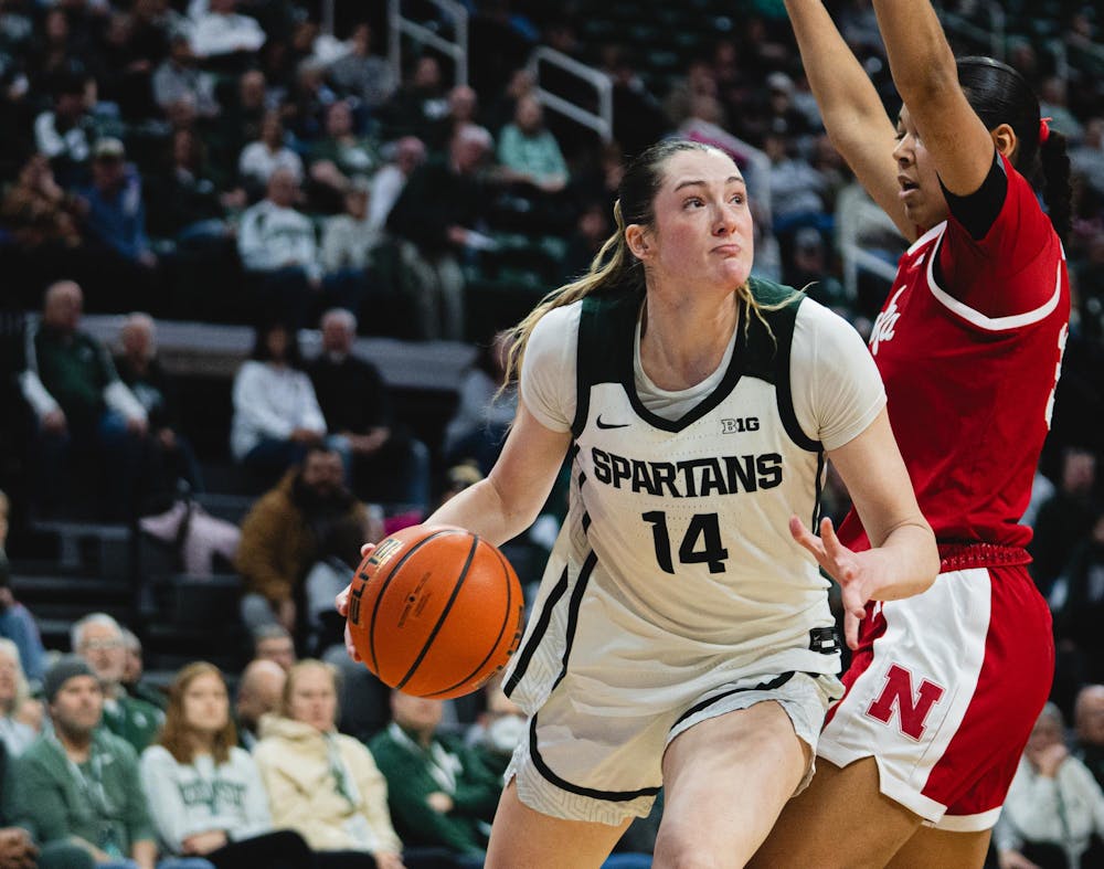 <p>MSU senior forward Grace VanSlooten (14) dribbles the ball past Nebraska at the Breslin Center in East Lansing, MI, on Jan. 15, 2026.</p>