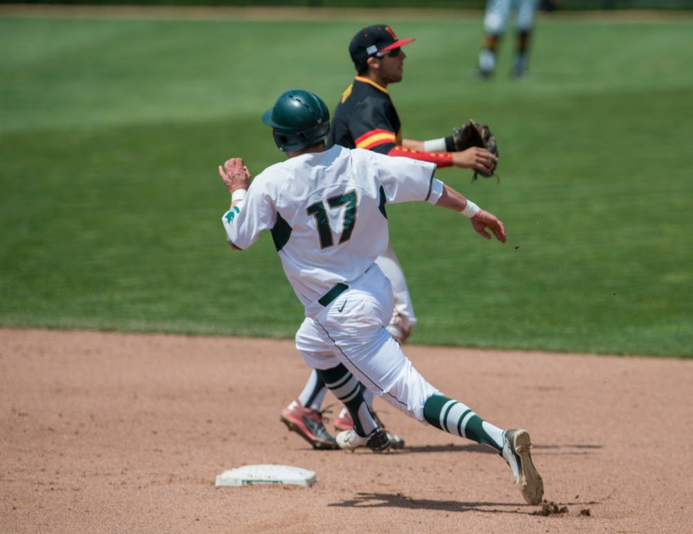 Senior infielder and outfielder Kris Simonton (17) runs past second base during the game against Maryland on May 21, 2016 at McLane Baseball Stadium at Kobs Field. The Spartans were defeated by the Terrapins, 6-4.