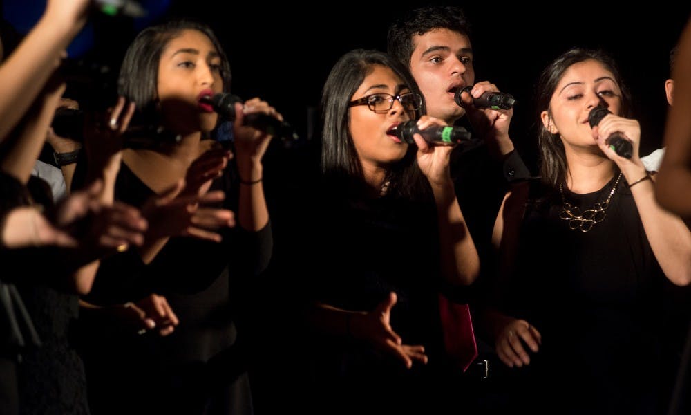 <p>Members of the group Spartan Sur perform on Oct. 10, 2015, during Accapalooza at Hannah Community Center. This annual event was hosted by the Ladies First accapella group and featured seven groups. </p>