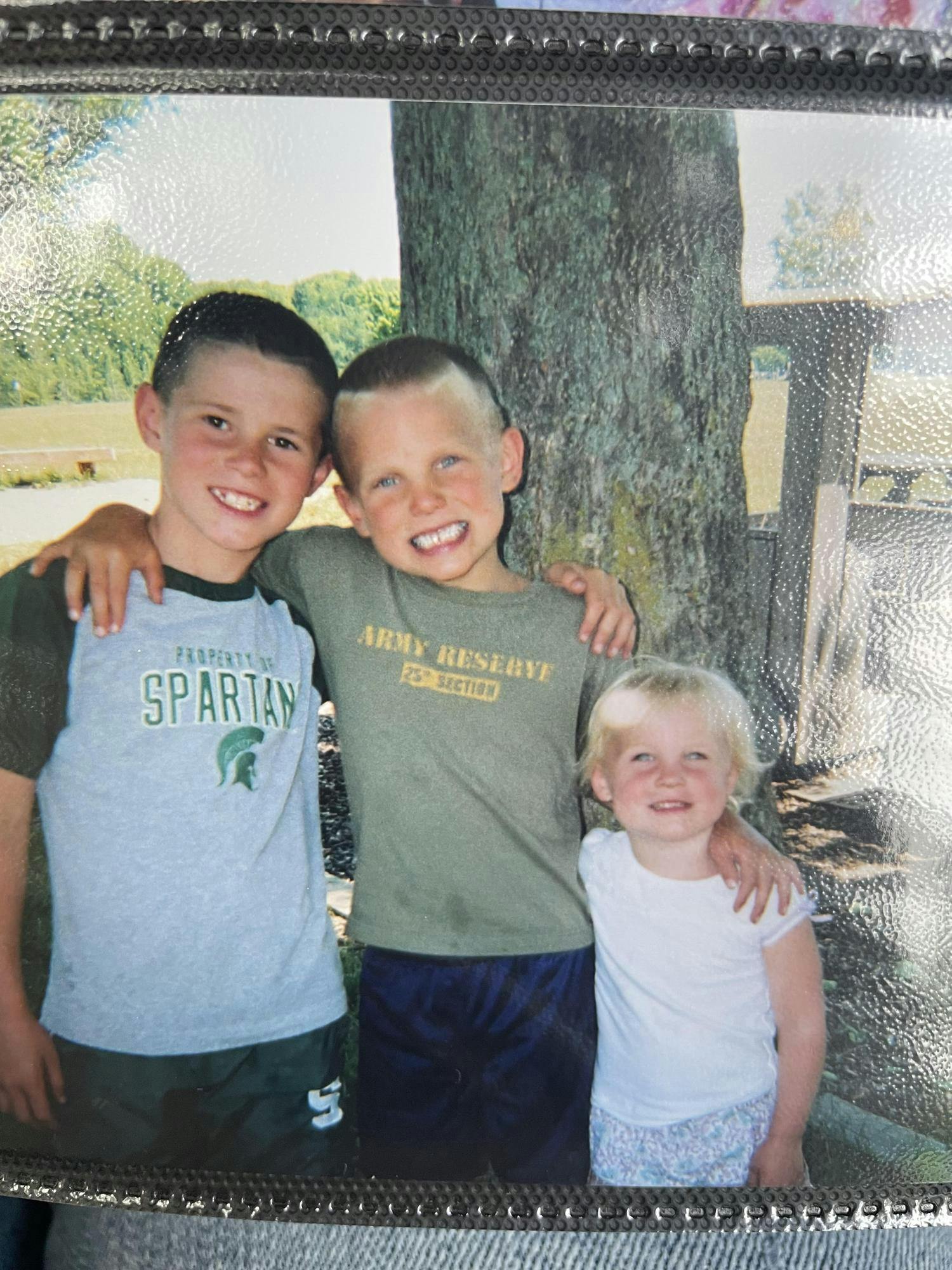 <p>Tanner Hallock (left), Tate Hallock (middle), and Theryn Hallock (right) have all played Division I athletics at Michigan State University. Photo Courtesy of Theryn Hallock.</p>