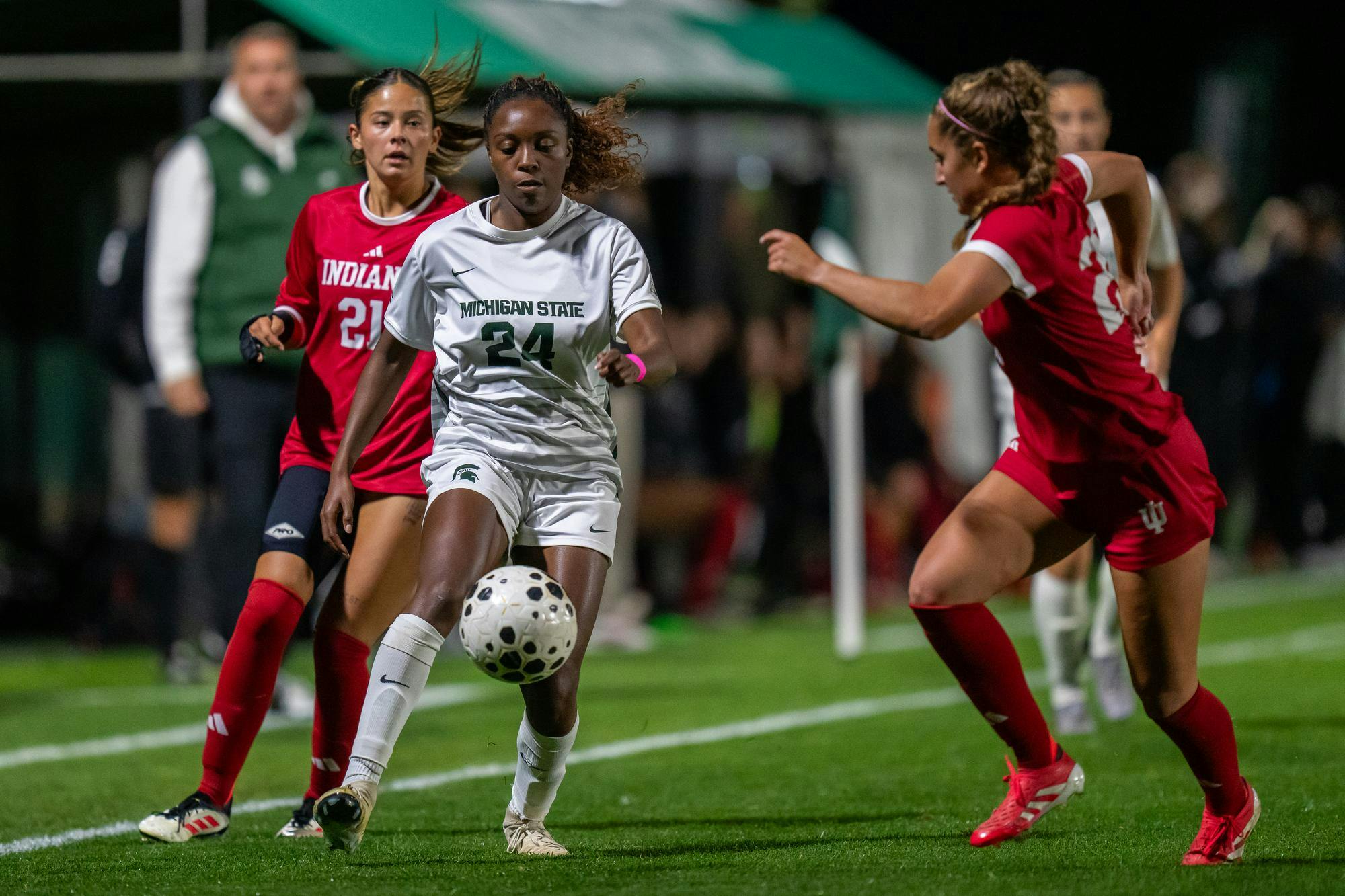 <p>MSU junior forward Kennedy Bell (24) moves past Indiana defense at DeMartin Soccer Stadium in East Lansing, Michigan on Thursday, Oct. 16, 2025.</p>