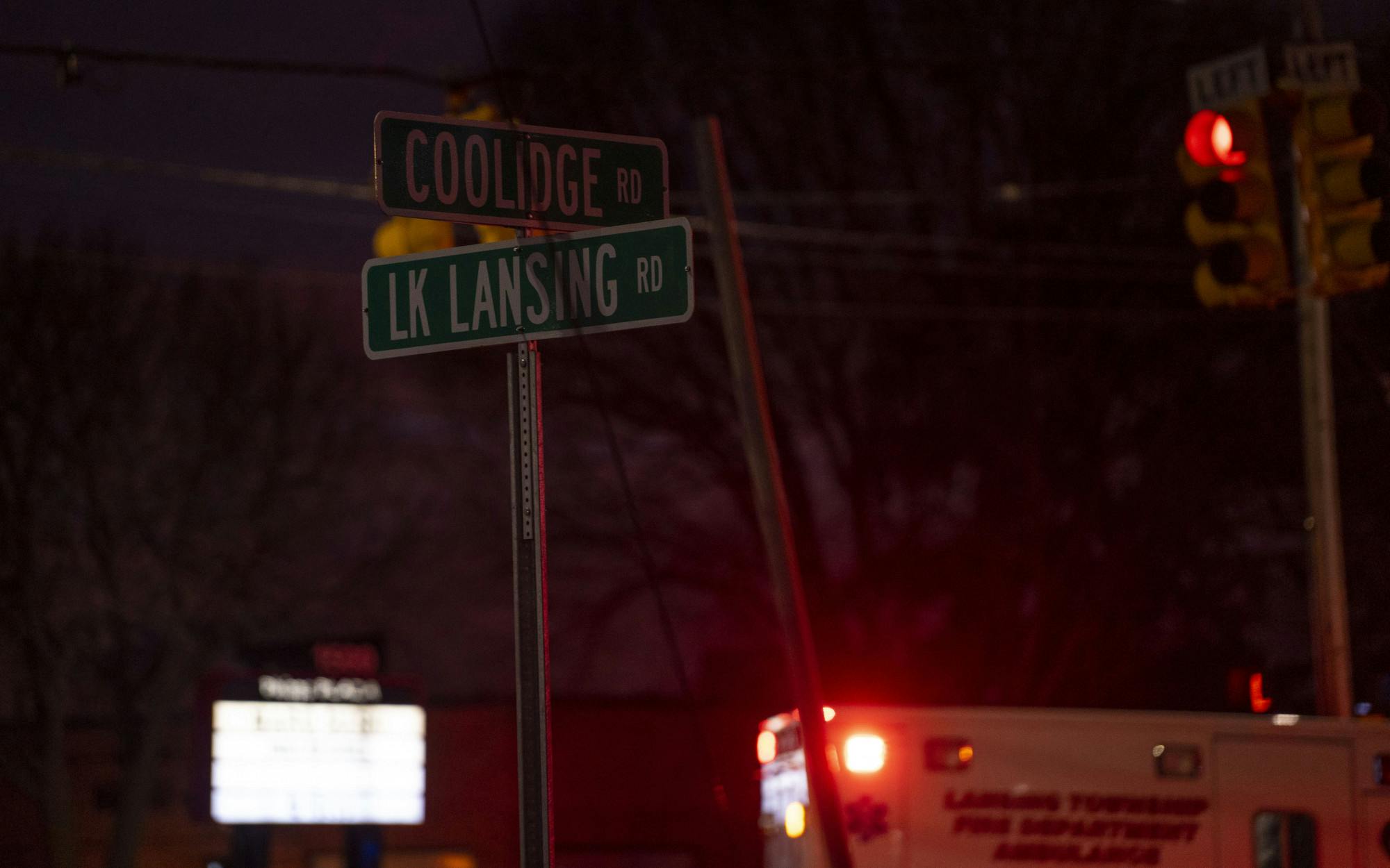 East Lansing Fire and Police Departments respond to a car accident at the intersection of Lake Lansing and Coolidge roads on Wednesday, April 5, 2023. 