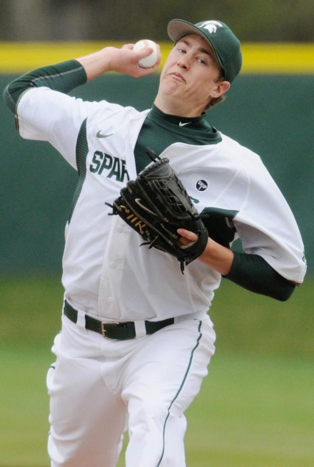 Senior right-handed pitcher Tony Bucciferro throws the ball on Saturday afternoon at McLane Baseball Stadium at Old College Field. The Spartans fell to the Buckeyes 1-0 on Saturday afternoon during their first game of the three-game series. Justin Wan/The State News