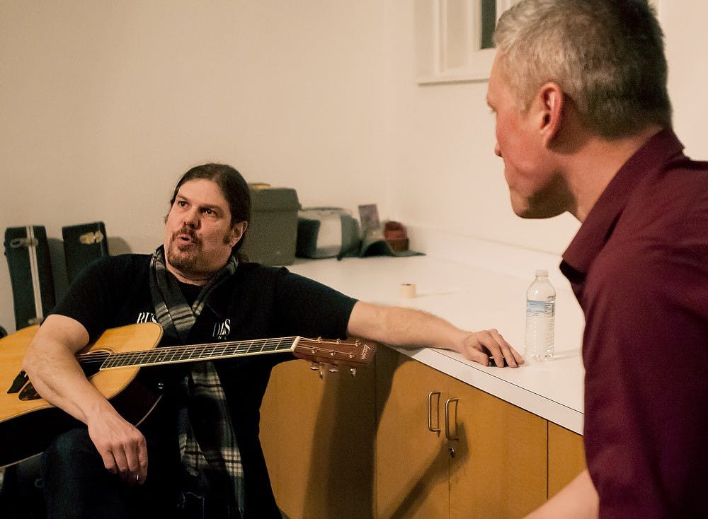 	<p>Drew Howard and Josh Rose talk about their history in music before their show at the Pump House, 368 Orchard Street, East Lansing, Mich., 48823. Howard represents Mason and Rose represents Ada, Mich., in the three singer/songwriter round. Erin Hampton/The State News</p>
