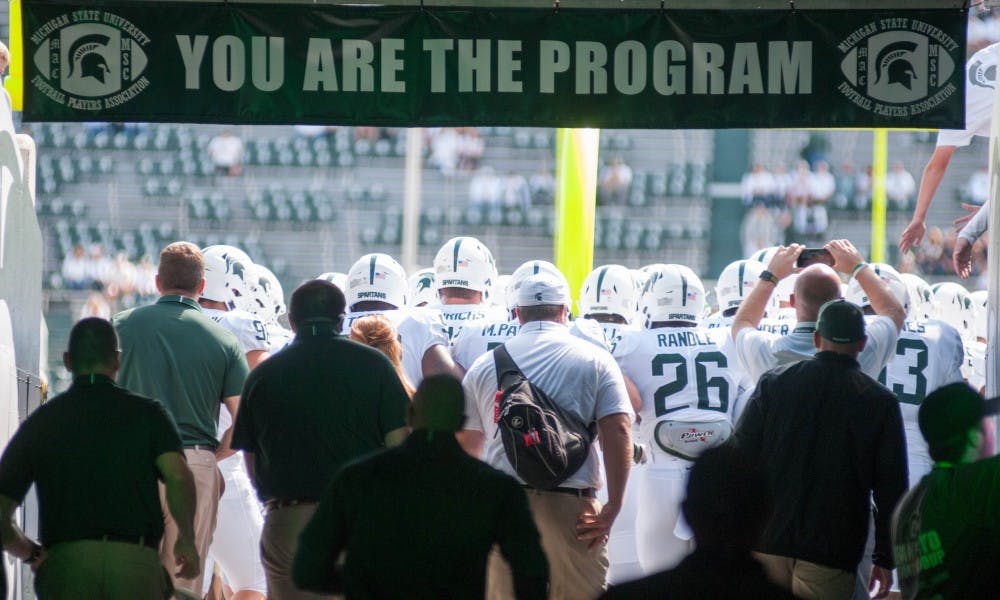 <p>The Spartans head out through the tunnel before the game against Western Michigan University on Sep. 9, 2017 at Spartan Stadium. The Spartans defeated the Broncos 28-14.</p>