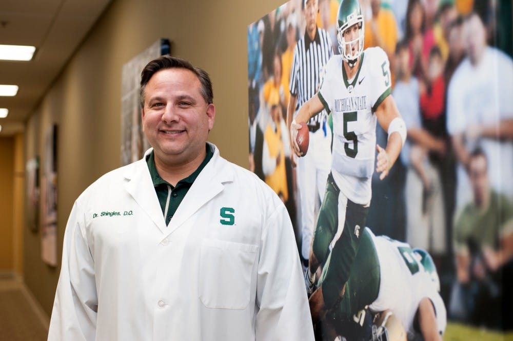 Dr. Michael Shingles  poses for a portrait on Jan. 25, 2016 at the MSU Sports Medicine office at 4660 South Hagadorn.