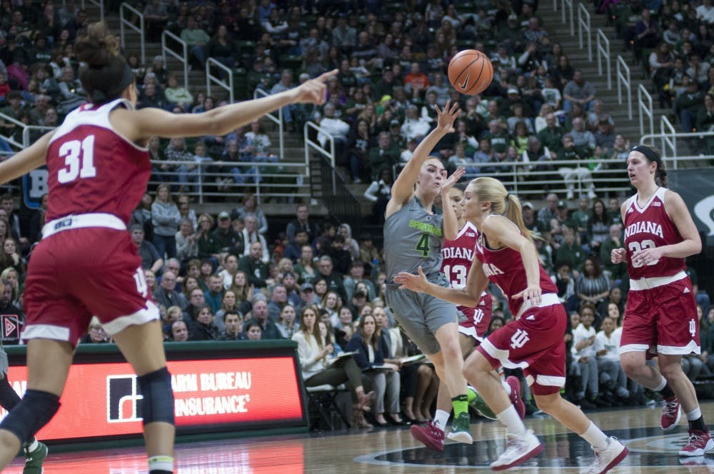 Sophomore guard Taryn McCutcheon (4) makes a cross court pass during the first half of the women's basketball game against Indiana on Jan. 20, 2018 at Breslin Center. The Spartans trailed in the first half, 45-32. (C.J. Weiss | The State News)