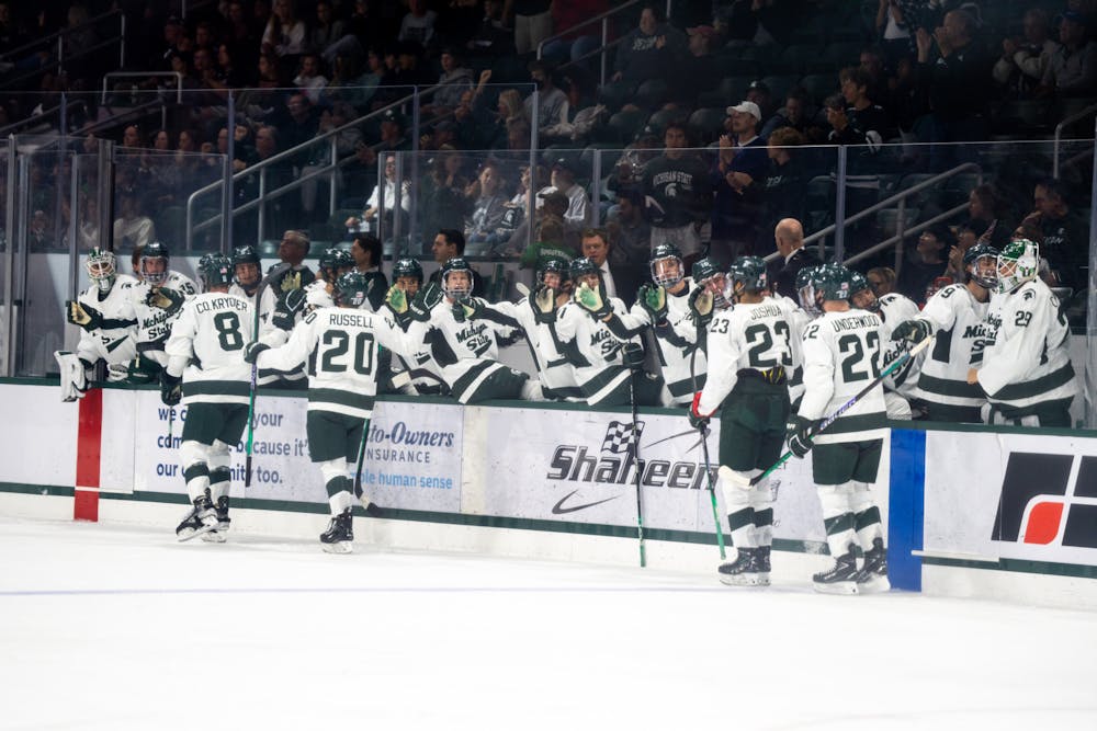 <p>The Spartans celebrate after scoring a point at Munn Ice Arena on Oct. 1, 2022. The Spartans lost to the USNTDP 4-3.</p>