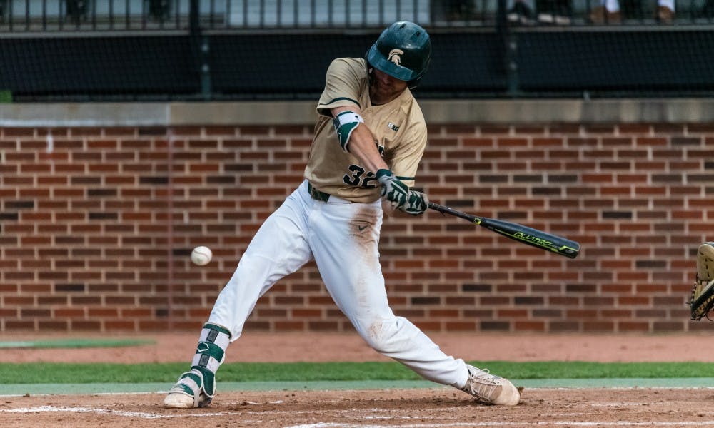 <p>Sophomore infielder Zach Iverson (32) swings at a pitch. The Spartans beat the Fighting Illini, 5-2, on May 17, 2019 at McLane Baseball Stadium.</p>