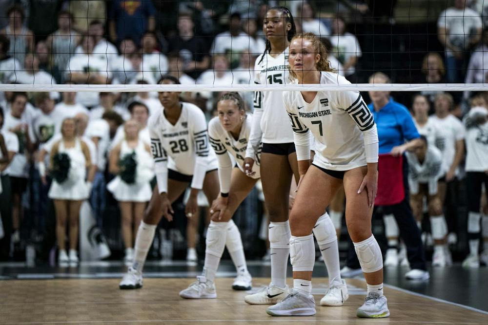 The Michigan State volleyball team prepares to return a serve during a match at the Breslin Center in East Lansing, Mich., on Friday, Sept. 2026.