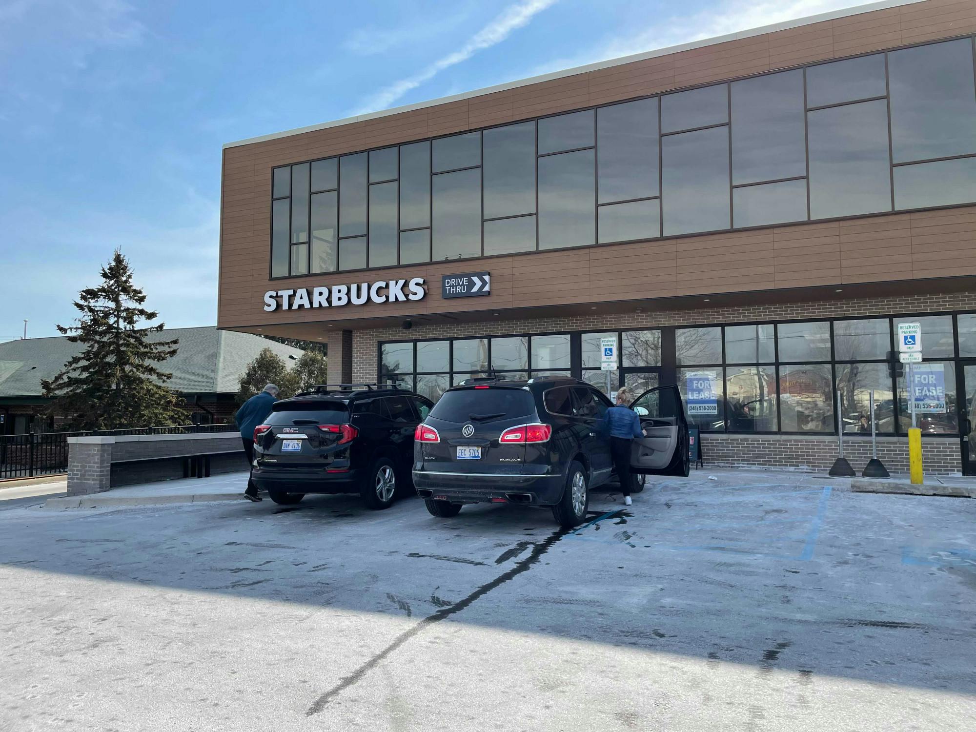 <p>Customers get into their vehicles after visiting the Lake Lansing Starbucks store. The Lake Lansing location filed for a union election in February, the first in greater-Lansing to follow a nationwide trend.</p>