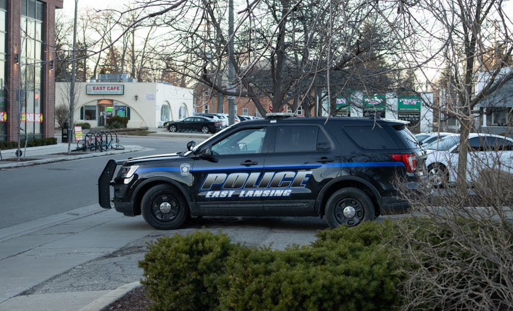 <p>Police are seen all around the area surrounding Cedar Village Apartments including the McDonald&#x27;s, in anticipation for whatever may happen after the Michigan State and Duke March Madness game in which Duke won 85-76, on Mar. 20, 2022.</p>