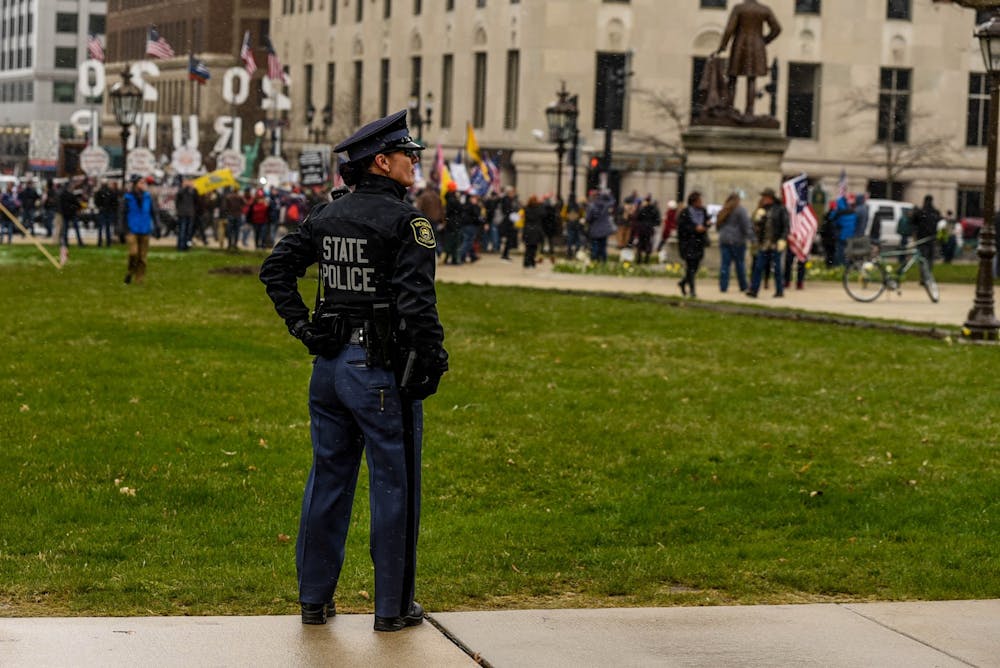 Scenes from the Operation Gridlock protest on April 15, 2020 around the Michigan State Capitol Building.