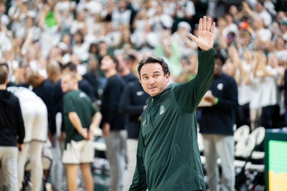 <p>Michigan State's newly minted Head Football Coach Jonathan Smith welcomed by the crowd during the men's basketball game against Georgia Southern at the Jack BReslin Student Events Center on Nov. 28, 2023. The Spartans went on to win 86-55.</p>