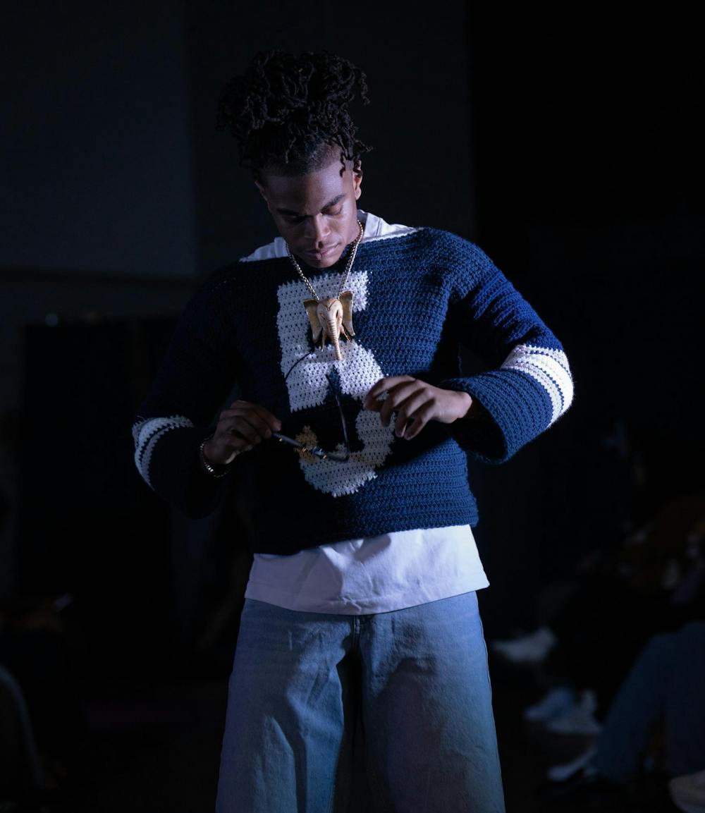 <p>A model poses in a crocheted shirt designed by Vincitcia. </p>