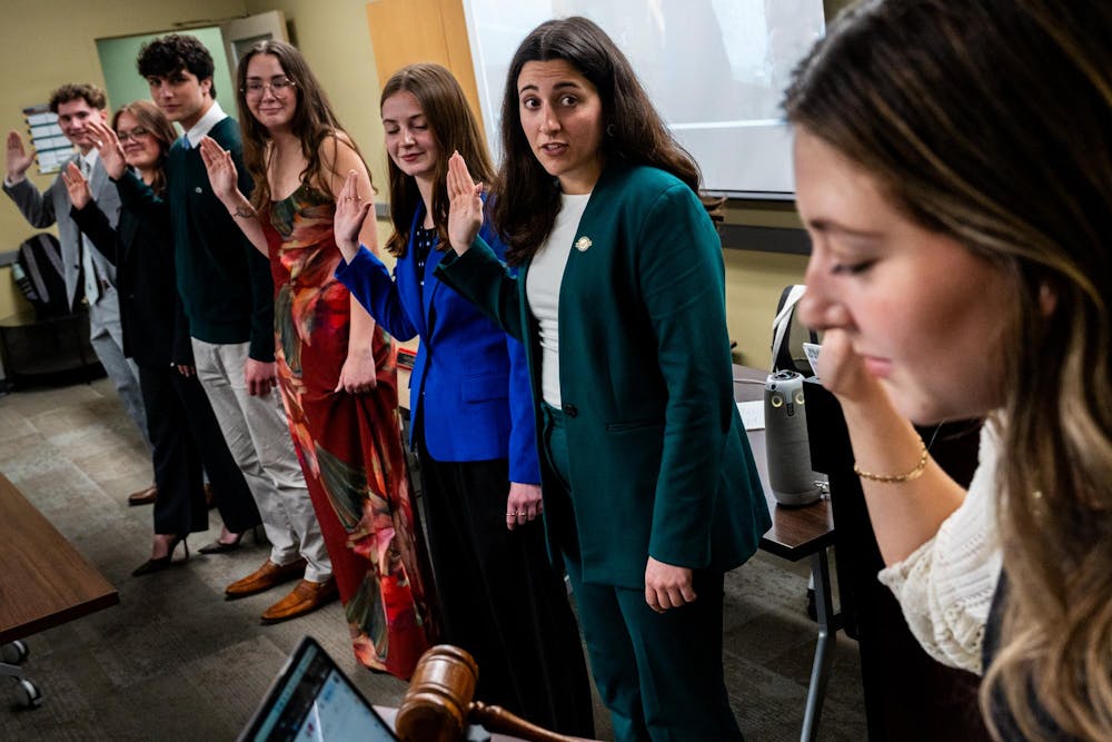 The 63rd session of the Associated Students of Michigan State University Office of the President is sworn in by former 62nd session President Kathryn Harding in the ASMSU Conference Room in the Student Services Building on Michigan State University’s campus in East Lansing, Mich., on Thursday, April 16, 2026. The election process is a three-day parliamentary-style election.