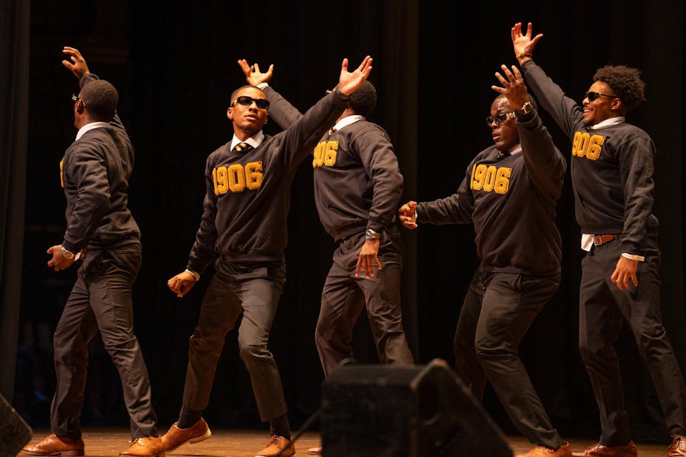 Members of the Alpha Phi Alpha fraternity perform at MSU’s National Pan Hellenic Council Yard Show at the Wharton Center’s Great Cobb Hall on Sept. 21, 2023. 