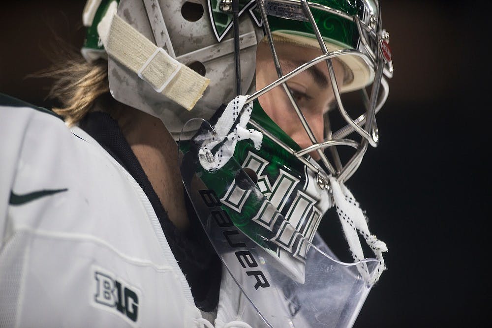 <p>Junior goaltender Jake Hildebrand skates across the ice before the game against Clarkson on Dec. 14, 2014, at Munn Ice Arena. The Spartans defeated the Golden Knights, 6-4. Danyelle Morrow/The State News</p>
