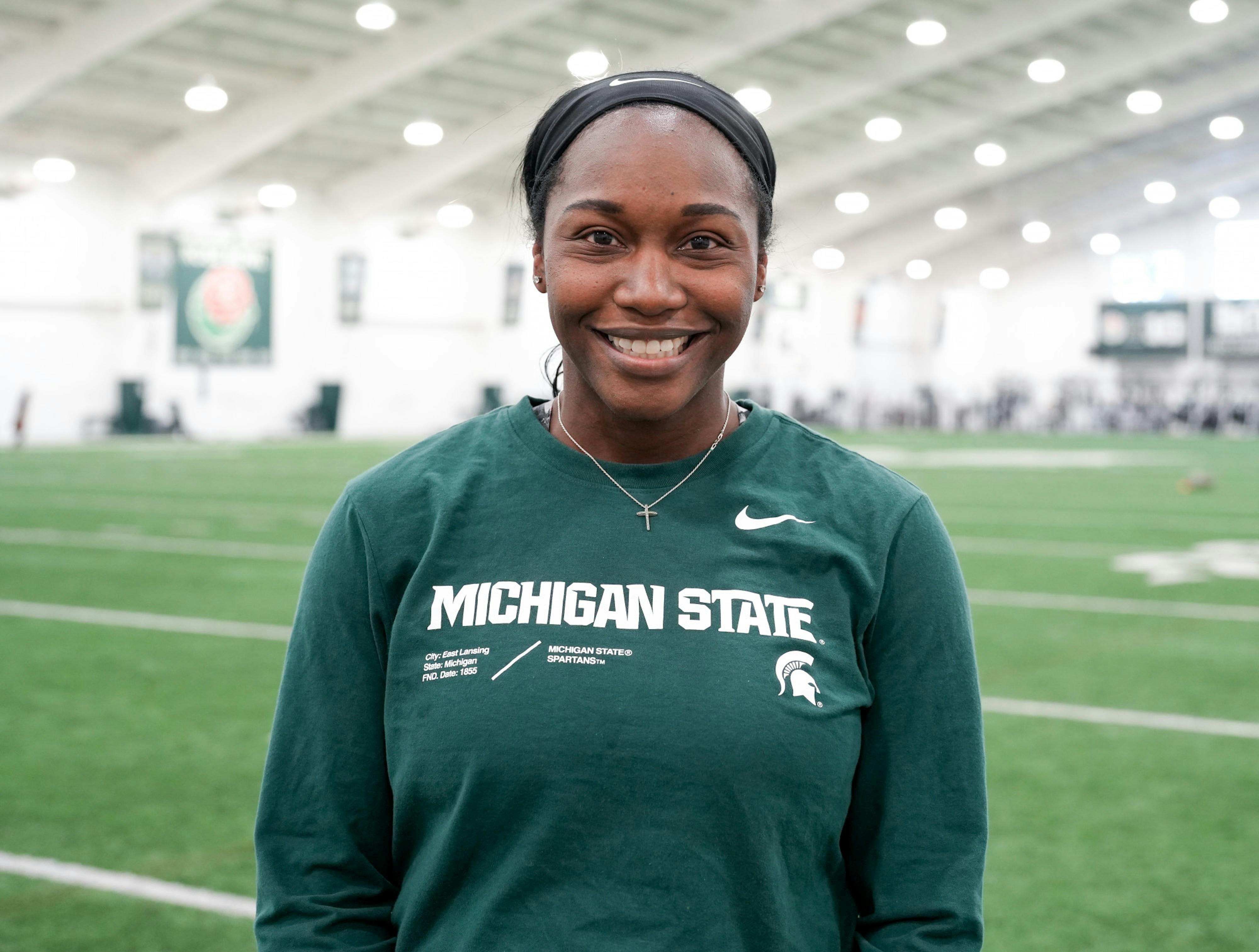 <p>The new MSU head coach Sharonda McDonald-Kelley poses for a photo on the field inside the Duffy Daugherty Football building on Jan. 31, 2023.</p>