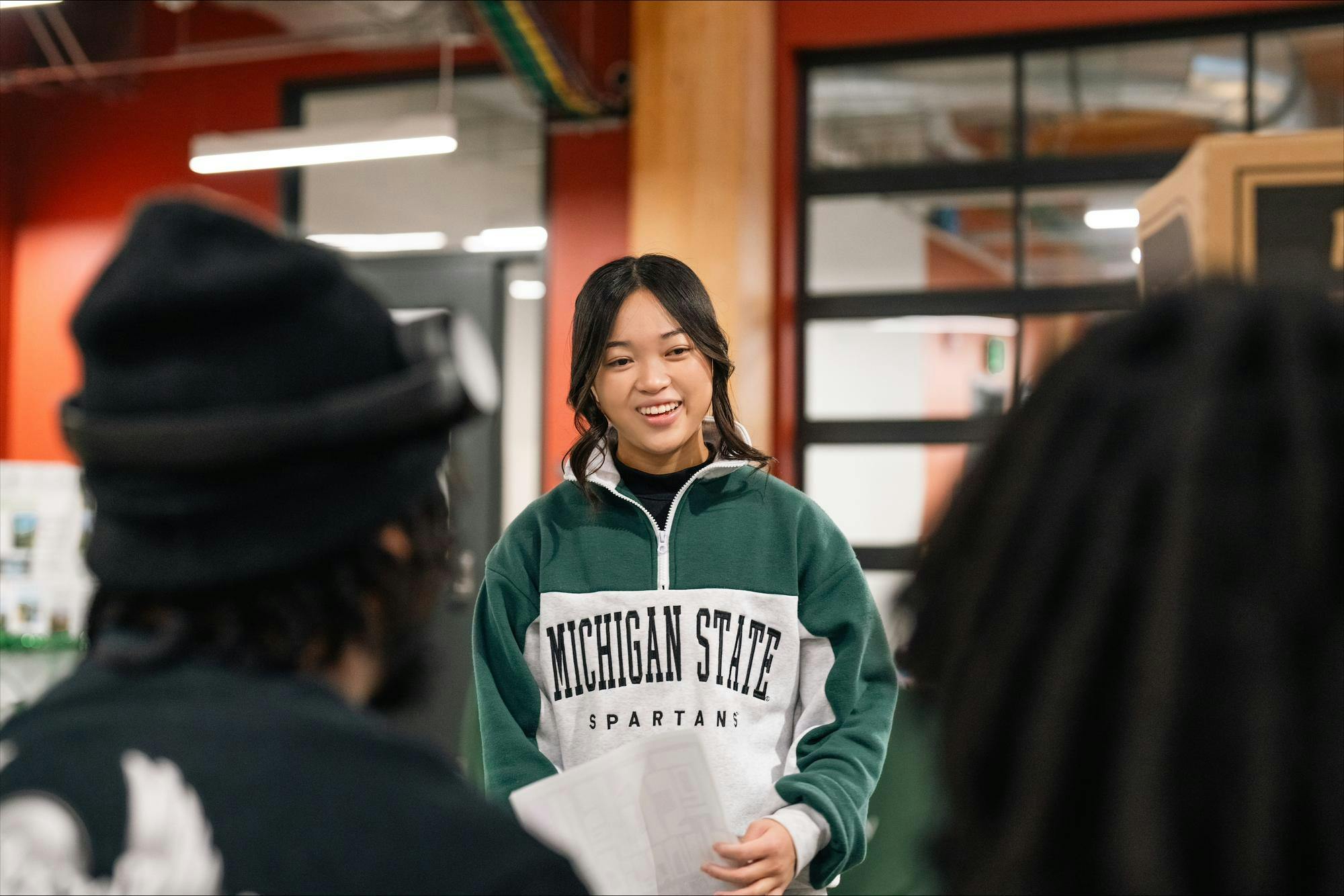 <p>Kassidy Do, Residents Hall Association Chief HOPE officer, talks at RHA showcase at the STEM Teaching and Learning Facility on Michigan State University's Campus, on April 7, 2026. Photo courtesy of Chris Buller</p>