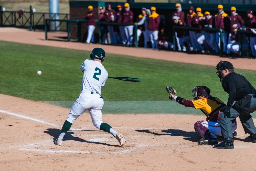 <p>Senior Marty Bechina swings at a pitch against Central Michigan. The Spartans lost to the Chippewas, 6-8, at McLane Baseball Stadium on April 3, 2019.</p>