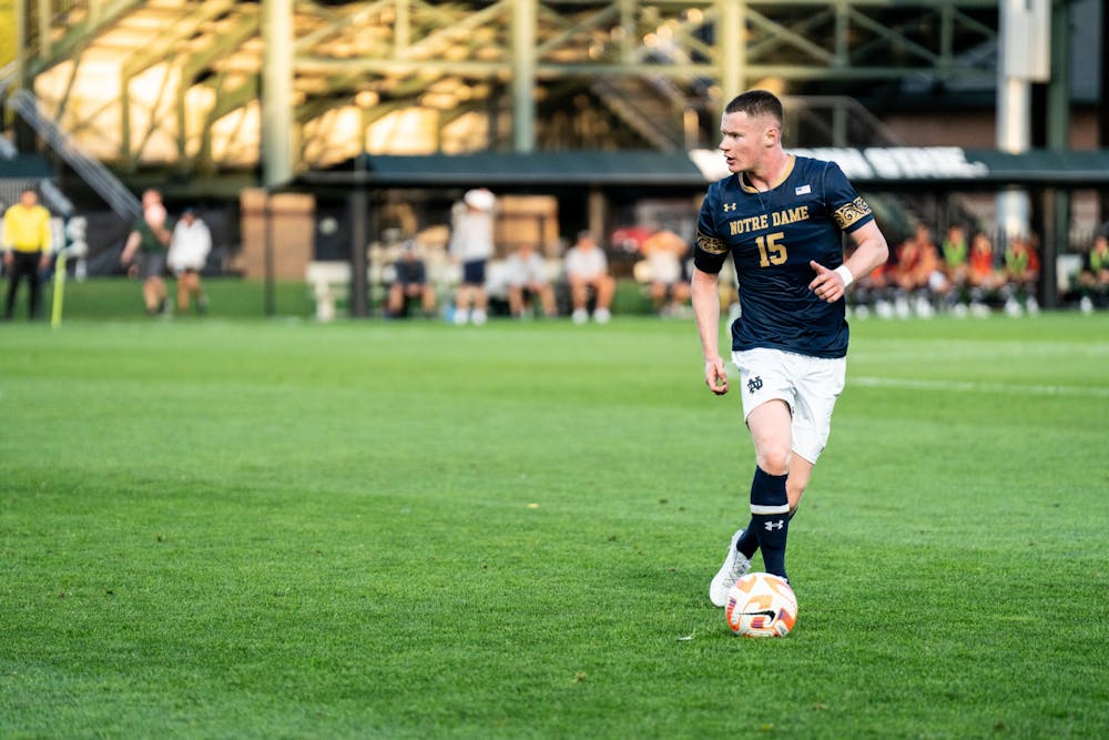 <p>Notre Dame&#x27;s junior defender Paddy Burns dribbles the ball down the field on Aug. 29, 2022.</p>