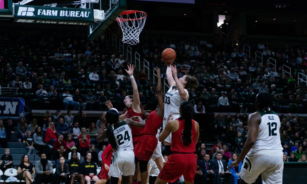 <p>Senior Jenna Allen steals a rebound away from several players during the game against Maryland at the Breslin Center on Jan. 17, 2019. The Spartans defeated the Terrapins, 77-60.</p>