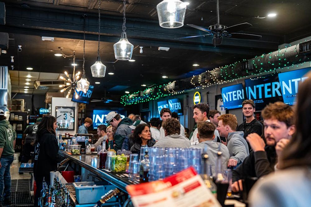 <p>Spectators watch MSU hockey take on the Wisconsin Badgers at Lou and Harry's Bar and Grill in East Lansing, MI on March 28, 2026. The Spartans fell to the Badgers in overtime, 4-3.</p>