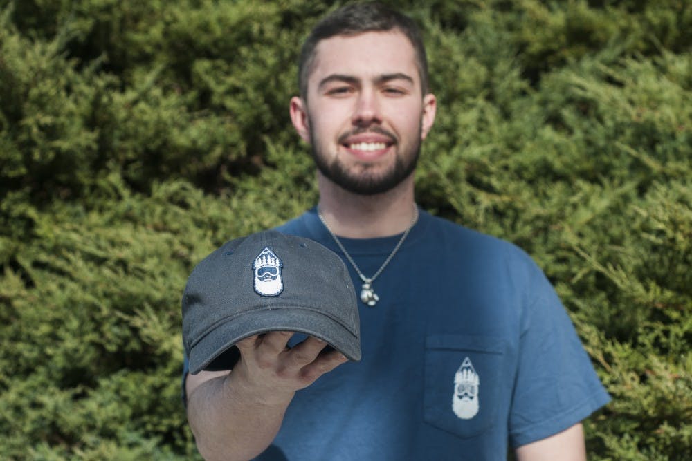 Marketing junior Braden Cleary poses for a portrait on Feb. 16, 2016 at Communication Arts and Sciences Building. Cleary is wearing apparel from his outdoor apparel company, TheMountCo, that he started with friends. 