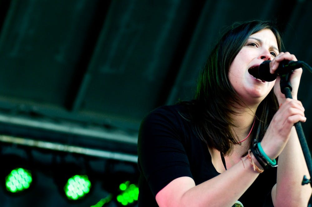 	<p>Lead singer and key player of Lansing-based band Life Size Ghost Talitha Snowden performs Monday at Adult Swim’s Ragbag of Jollification held at Mac’s Bar, 2700 E. Michigan Ave., in Lansing.</p>