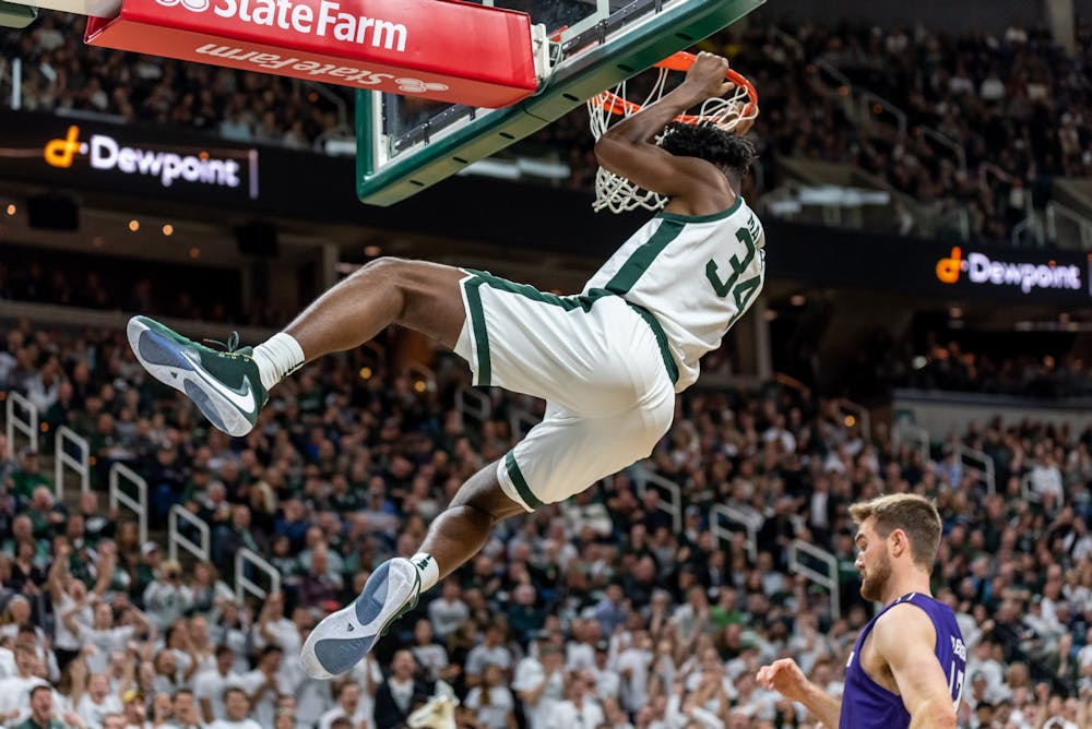 <p>Freshman forward Julius Marble dunks the ball against Northwestern.The Spartans defeated the Wildcats, 79-50, at the Breslin Student Events Center on January 29, 2020. </p>