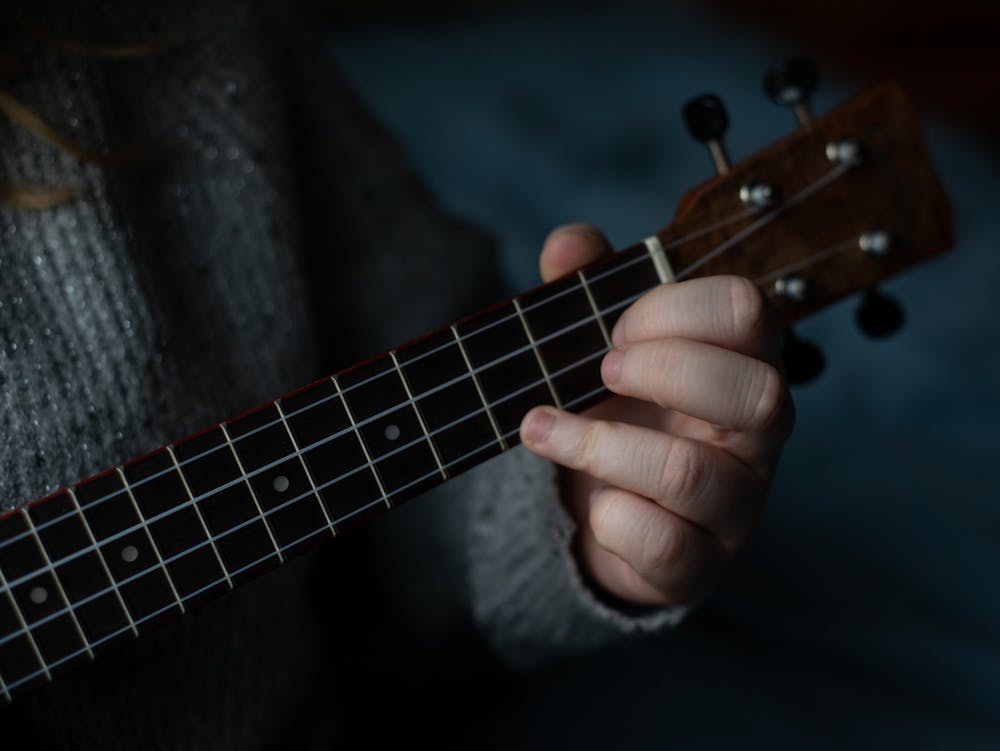 Kristina Katilius plays her ukulele during the coronavirus quarantine on March 24, 2020.