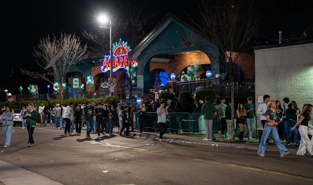 <p>Fans head home after watching UConn defeat Michigan State in the NCAA men’s basketball tournament regional semifinal game at Harper’s Restaurant &amp; Brew Pub in East Lansing, Michigan on Friday, March 27, 2026.</p>